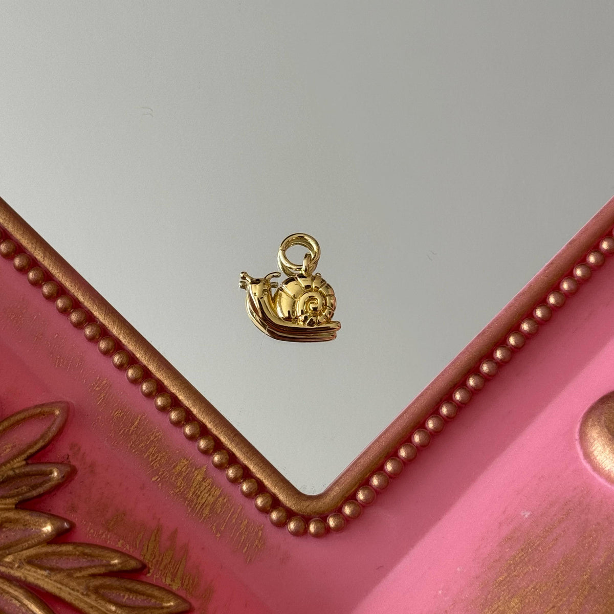 Charm Caracol Baño de oro