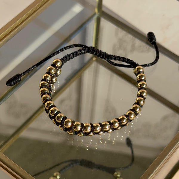Pulsera Negra Balines Baño de oro