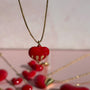 Collar Corazón Rojo en Llamas