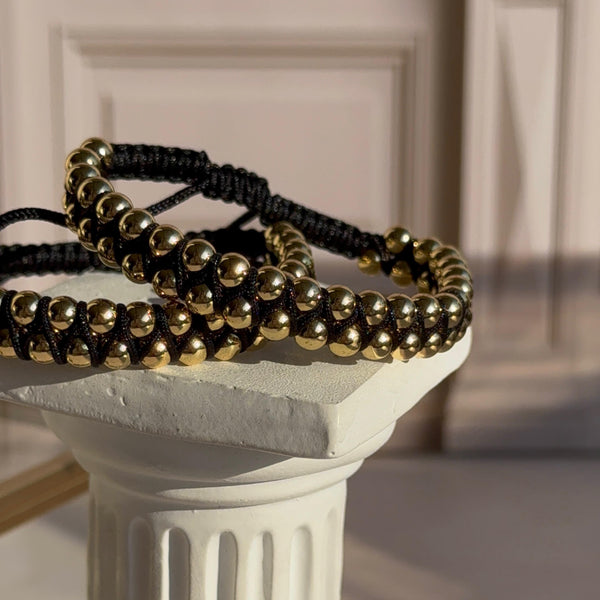 Pulsera Negra Balines Baño de oro