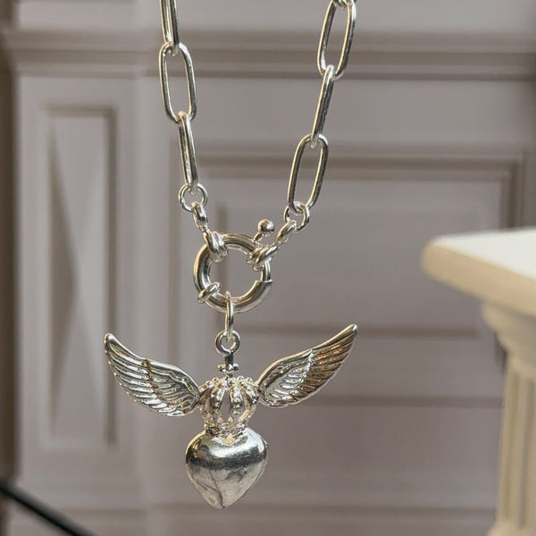 Collar Corazón Detente Alado Baño de Plata