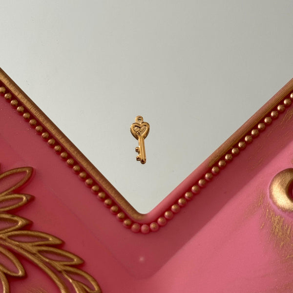 Charm Llave Baño de oro