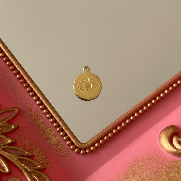 Charm Medalla Ojo Baño de oro
