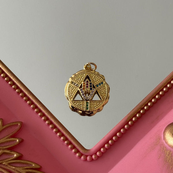 Charm Medallón Manito y Ojito Circones Baño de oro