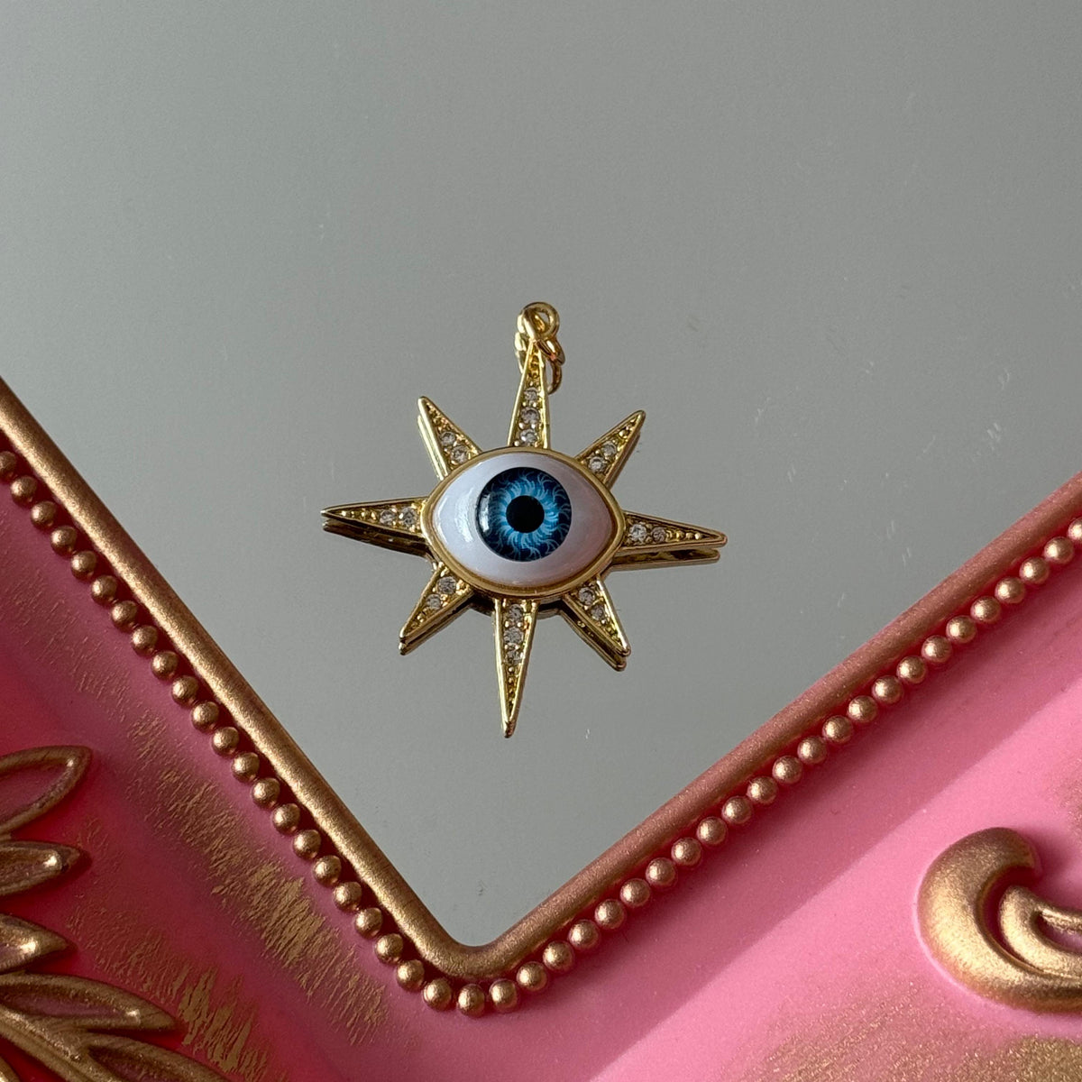 Charm Ojo Solar Circones Baño de oro