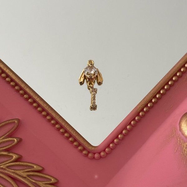Charm Perrito con Hueso Circones Baño de oro