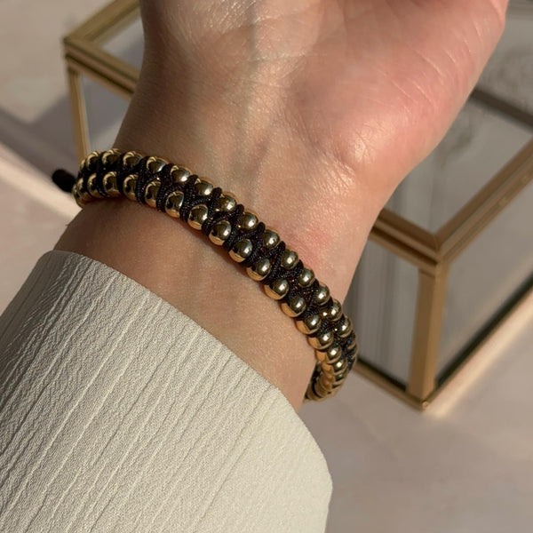 Pulsera Negra Balines Baño de oro