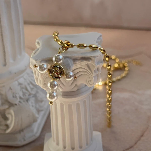 Collar Cruz Perlada con Ángel de la Guarda