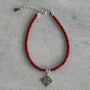Pulsera Roja Cristales Nudo de Bruja